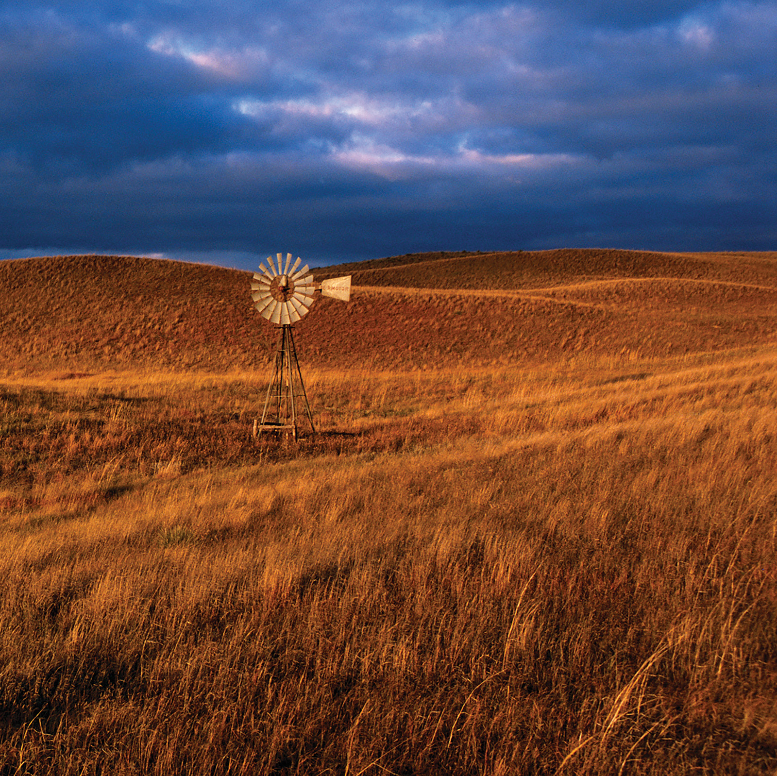 Prairie and windmill in evening light, Valentine National Wildlife Refuge, Cherry County.