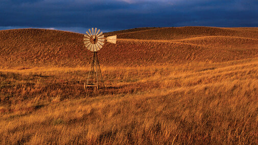 Prairie and windmill in evening light, Valentine National Wildlife Refuge, Cherry County.